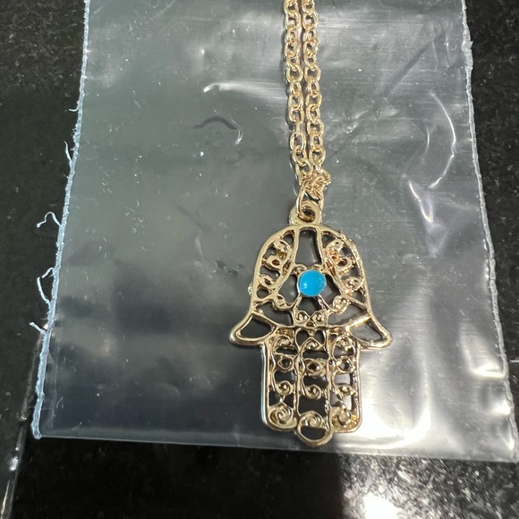 HAMSA IN GOLD TONE FILIGREE WITH A TURQUOISE COLORED STONE - Picture 7 of 8